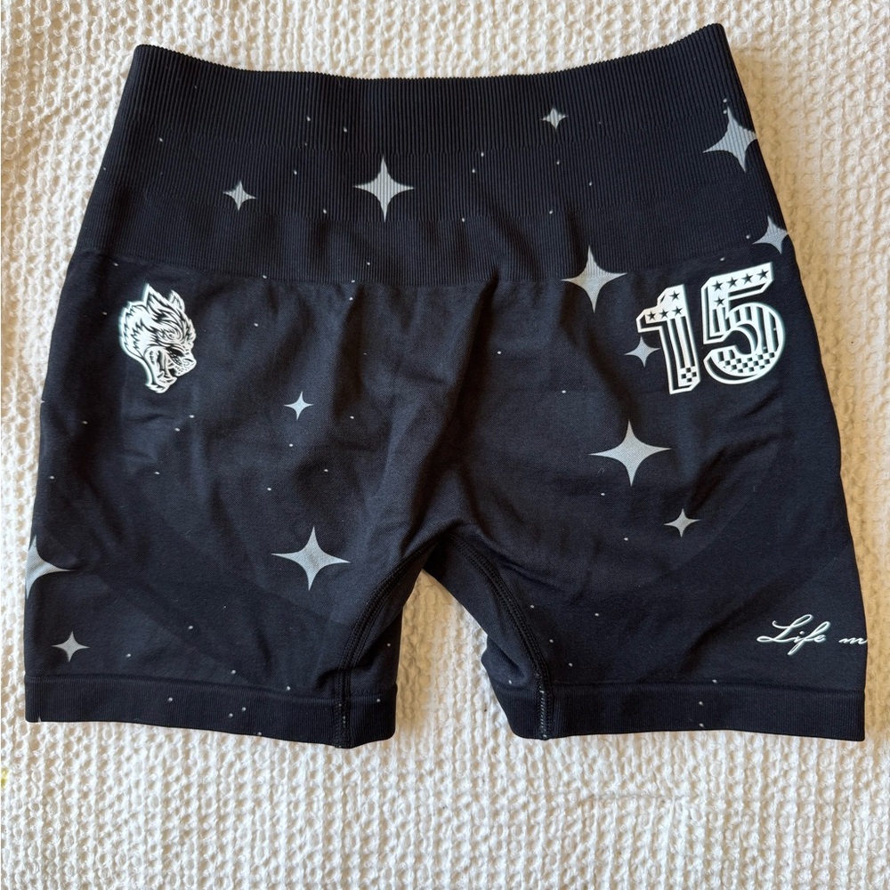 Darc Sport Black Athletic Bike Shorts with White Star and Graphic Accents - Picture 2 of 4